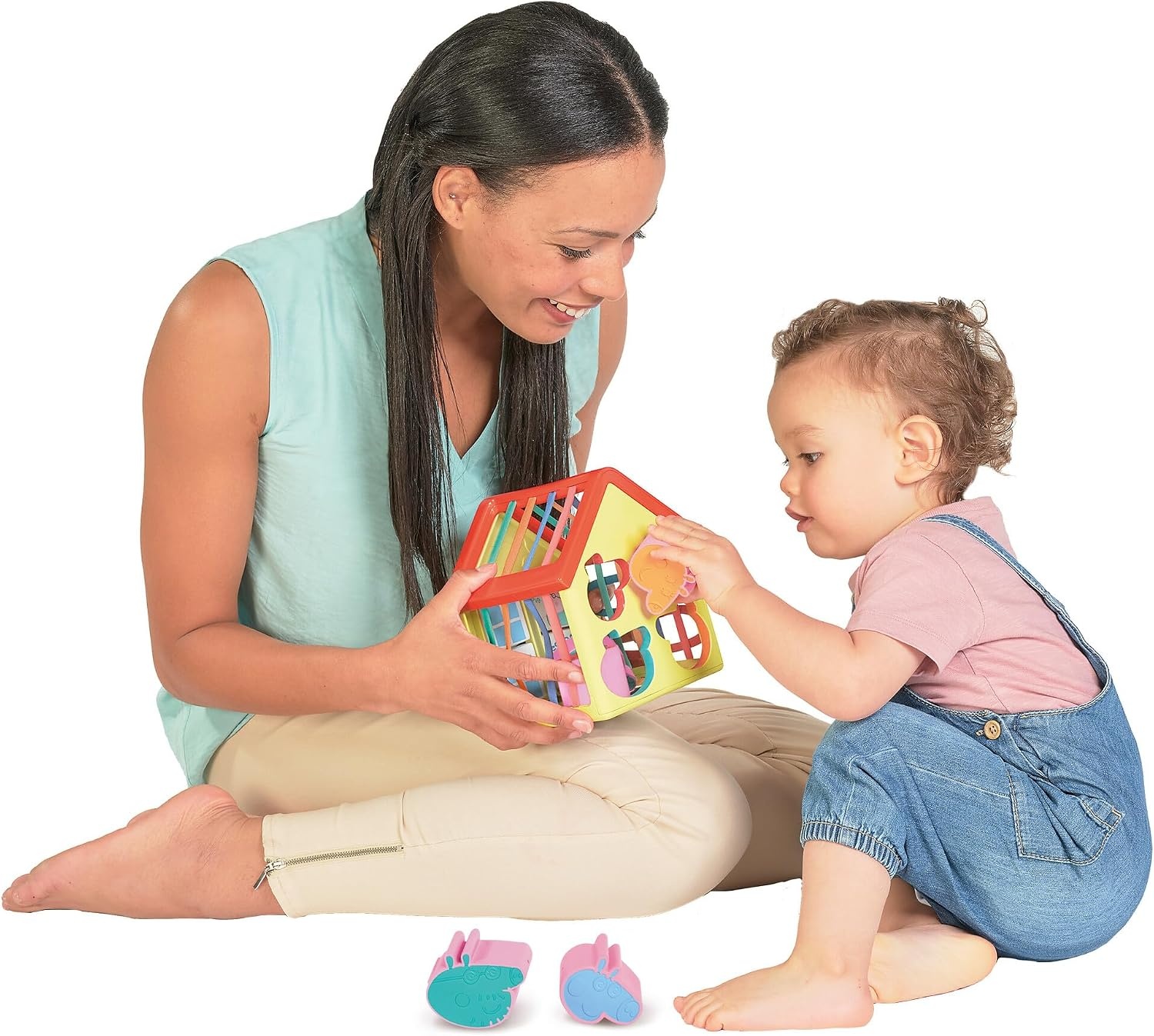 image:imageTOMY Toomies Grow with Peppa Pig  Peppas Activity House  Kids Activity Center with Sensory Shape Sorting and Color Matching Games  Includes 4 Peppa Pig Family Textured Blocks  18 Months and UpPeppas Activity House