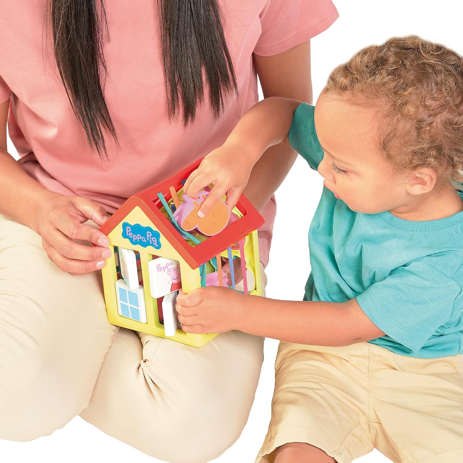 image:imageTOMY Toomies Grow with Peppa Pig  Peppas Activity House  Kids Activity Center with Sensory Shape Sorting and Color Matching Games  Includes 4 Peppa Pig Family Textured Blocks  18 Months and UpPeppas Activity House
