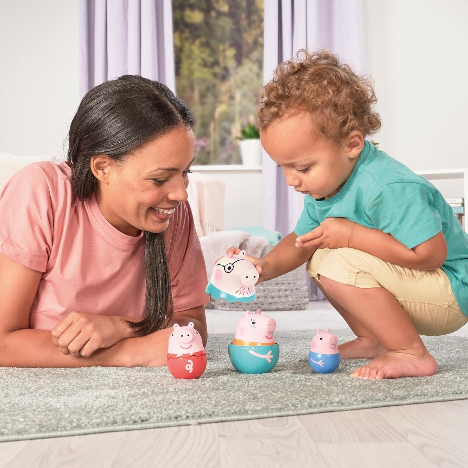 image:imageTOMY Toomies Grow with Peppa Pig  Peppas Activity House  Kids Activity Center with Sensory Shape Sorting and Color Matching Games  Includes 4 Peppa Pig Family Textured Blocks  18 Months and UpPeppas Nesting Family